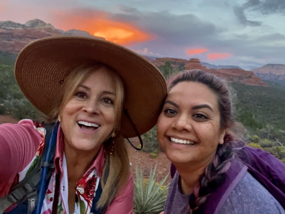 rosane and a client hiking together in sedona