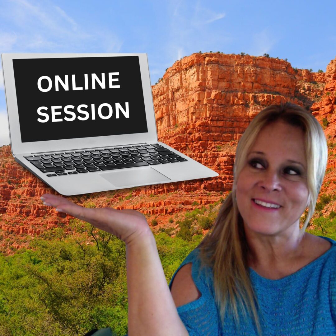 A woman holding up an open laptop with the words " online session " on it.